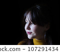 A beautiful young woman posing for portraits 107291434