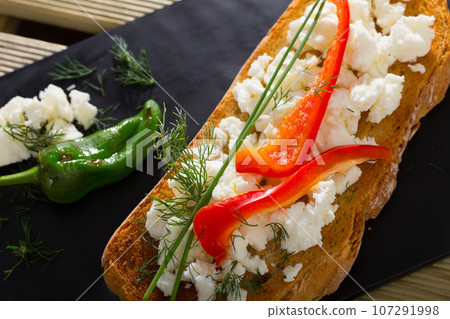 Bulgarian toast with brinsen cheese, bell pepper Bulgarian toast with brinsen cheese, bell pepper 107291998