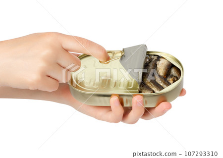Hands pull a ring on a tin can. Isolate on a white background. 107293310