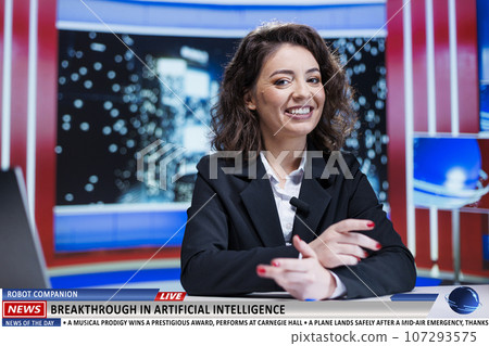 Presenter of night show covers latest news while providing television program content about progress of artificial intelligence and technology industry. Machine learning insights used by newscasters. 107293575