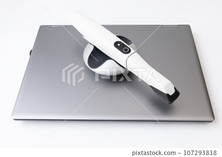 Isolated 3d Intraoral Dental Tooth Scanner and Laptop on White Background. Dental Equipment, Device For Scanning Teeth. Dentistry And Health Care Concept . Horizontal Flat Lay View,  107293818
