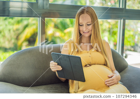 Mobile pregnancy online maternity application. Pregnant mother using phone. Pregnancy, medicine, pharmaceutics, health care and people concept 107294346