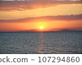 Sunset over the sea 107294860