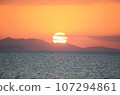Sunset over the sea 107294861