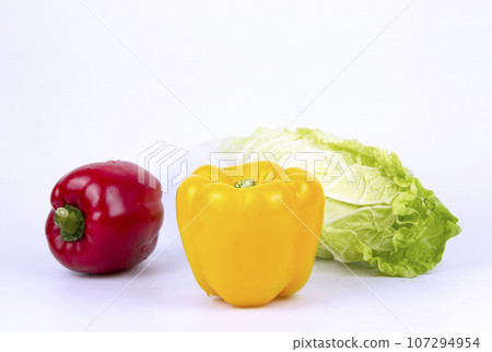 Vegetarian and vegan healthy lifestyle concept. Raw vegetables and fruits with empty plate over rustic background 107294954