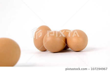 Vegetarian and vegan healthy lifestyle concept. Raw vegetables and fruits with empty plate over rustic background Vegetarian and vegan healthy lifestyle concept. Raw vegetables and fruits with empty plate over rustic background 107294967