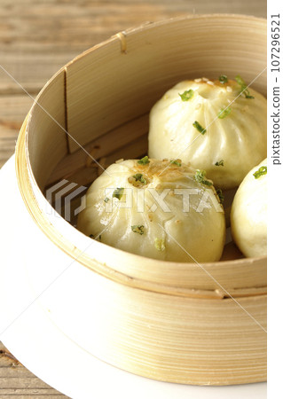 Xiaolongbao steamed in a steamer Xiaolongbao steamed in a steamer 107296521
