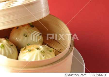 Xiaolongbao steamed in a steamer 107296691