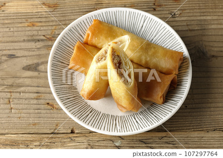 A bird's-eye view of spring rolls, a type of dim sum A bird's-eye view of spring rolls, a type of dim sum 107297764