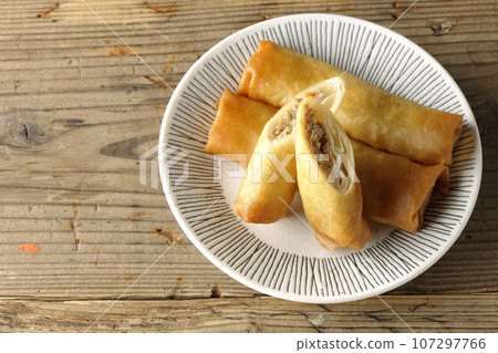 A bird's-eye view of spring rolls, a type of dim sum A bird's-eye view of spring rolls, a type of dim sum 107297766