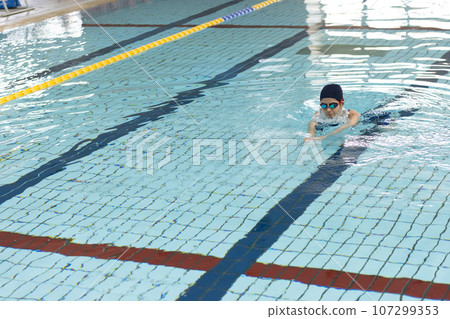 Woman swimming in the pool Woman swimming in the pool 107299353
