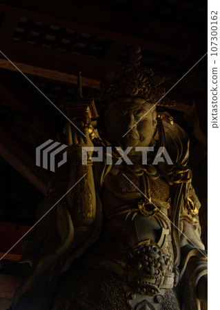 Tamonten standing statue in the Great Buddha Hall of Todaiji Temple Tamonten standing statue in the Great Buddha Hall of Todaiji Temple 107300162