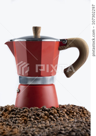 Coffee beans with a Moka pot coffee maker 107302297