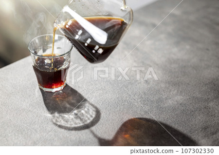 A cup of hot coffee 107302330