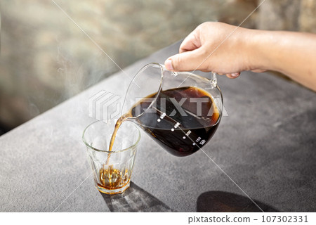 A cup of hot coffee 107302331