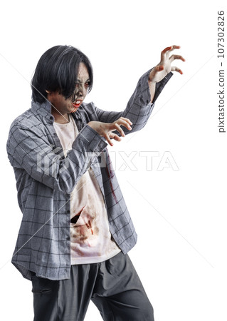 A scary zombie with blood and wounds on his body walking A scary zombie with blood and wounds on his body walking 107302826