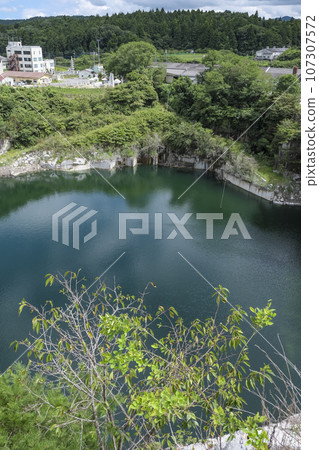 A lake filled with water at the site of a granite quarry 107307572