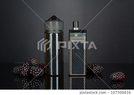 Vape smoking liquid with berry flavor close up Vape smoking liquid with berry flavor close up 107308816