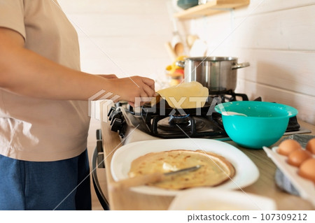 gas stove during pancake cooking gas stove during pancake cooking 107309212