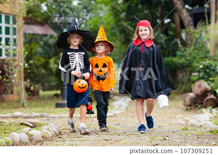 Kids trick or treat. Halloween fun for children. 107309251