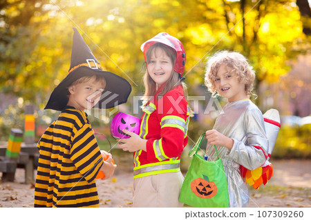 Kids trick or treat. Halloween fun for children. Kids trick or treat. Halloween fun for children. 107309260