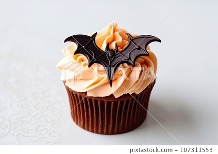 Halloween cupcake with bat topping 107311553
