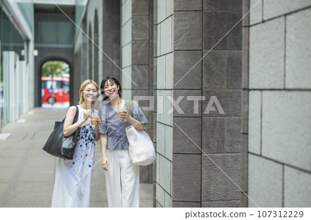 Young woman enjoying sightseeing on a girls trip Young woman enjoying sightseeing on a girls trip 107312229