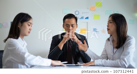 Asian young businesspeople are stress while working in meeting room, Tired businessman with headache at office, feeling sick at work 107312441