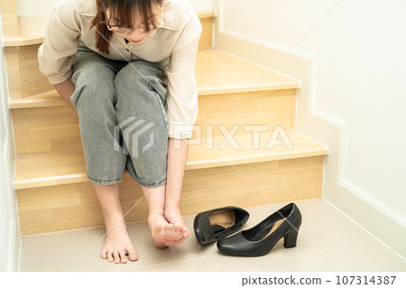 Asian woman fall down the stairs because slippery surfaces Asian woman fall down the stairs because slippery surfaces 107314387