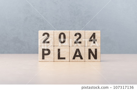 New Year 2024 business plan, strategies, goal, development and success. 2024 number and text plan on wooden cubes. 107317136