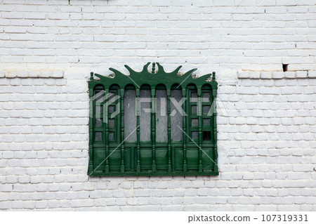 Detail of the beautiful colonial architecture of the streets of the colonial small town of Iza located in the Boyaca department in Colombia Detail of the beautiful colonial architecture of the streets of the colonial small town of Iza located in the Boyaca department in Colombia 107319331