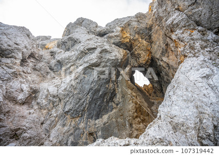 Prisojnik or Prisank Window. The larges rock window in Alps, Triglav National Park, Julian Alps, Slovenia 107319442