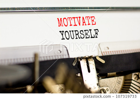 Motivate yourself symbol. Concept words Motivate yourself typed on beautiful old retro typewriter. Beautiful white paper background. Business psychology motivate yourself concept. Copy space. Motivate yourself symbol. Concept words Motivate yourself typed on beautiful old retro typewriter. Beautiful white paper background. Business psychology motivate yourself concept. Copy space. 107319733