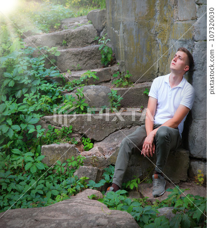 Sad men sitting on the steps Sad men sitting on the steps 107320030