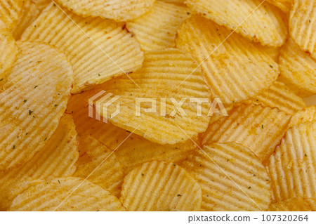 Lots of potato chips, texture Lots of potato chips, texture 107320264