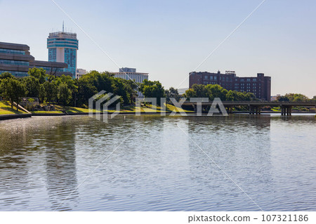 Sunny view of the cityscape and Veterans Memorial Park Sunny view of the cityscape and Veterans Memorial Park 107321186