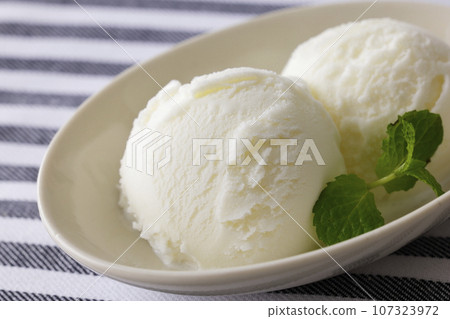 Milk ice cream made with milk on a plate 107323972