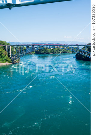 Swirl scenery visible from Saikai Bridge under a clear blue sky 107326556