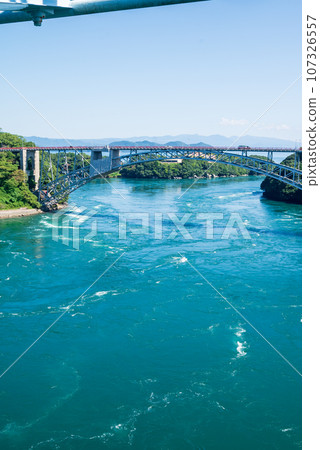 Swirl scenery visible from Saikai Bridge under a clear blue sky 107326557