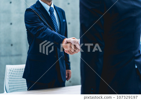 A businessman shaking hands A businessman shaking hands 107329197