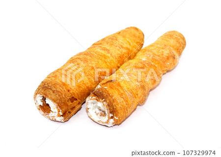 Puff cream Rolls on white background with selective focus 107329974