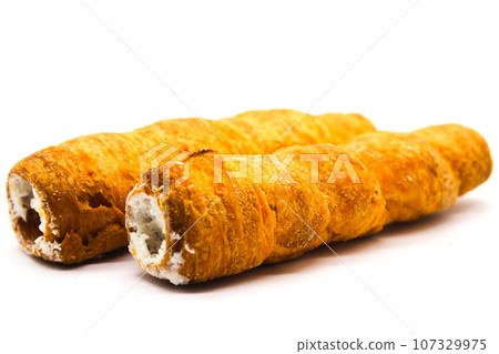 Puff cream Rolls on white background with selective focus 107329975