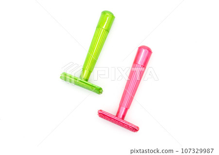 Razor on white background with selective focus Razor on white background with selective focus 107329987