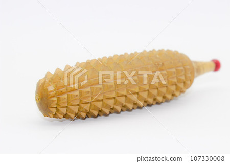 Massage roll on a white background Massage roll on a white background 107330008