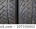 New car tire background with texture transport industry 107330402