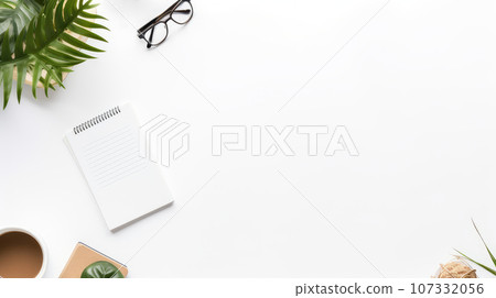 Stationery items on a white background with eyeglasses and a green plant. 107332056