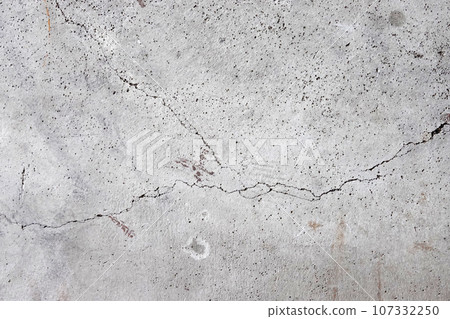 Concrete surface with only a few thin cracks 107332250