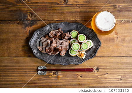 Stir-fried duck slices and chikuwa cucumber Stir-fried duck slices and chikuwa cucumber 107333520