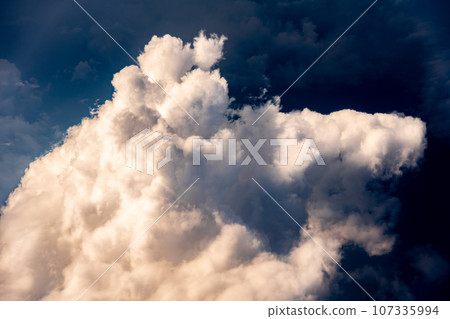 Cumulonimbus clouds aerial photography airplane sunset evening afternoon airplane flight travel tourism inbound Cumulonimbus clouds aerial photography airplane sunset evening afternoon airplane flight travel tourism inbound 107335994