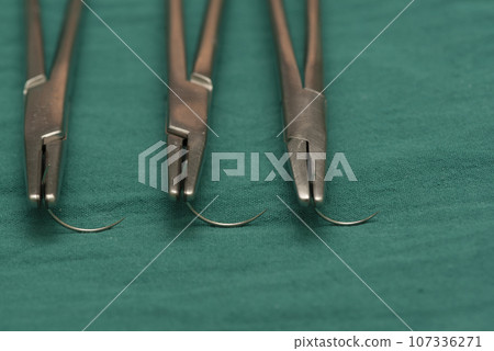 Three needle holders and empty needles Three needle holders and empty needles 107336271
